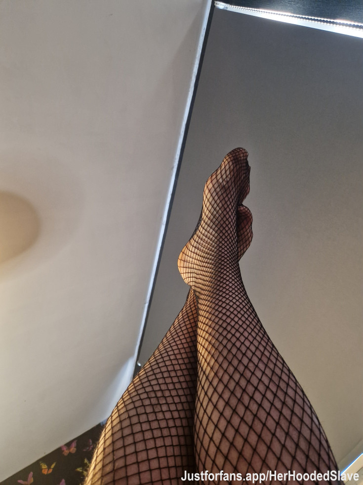 Feet in fishnets